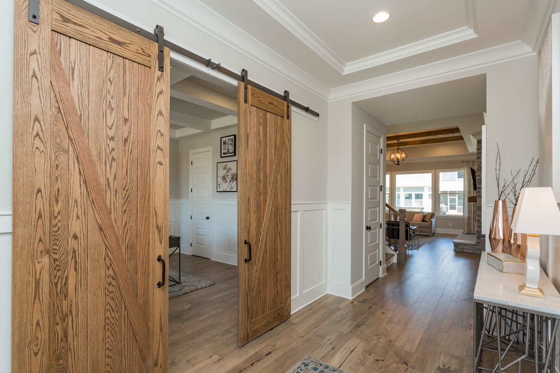 Drees Wood Doors The Rowlandu0027s Striking Exterior Sets The Tone For A Warm Welcome Inside The Foyer Leads You The Open Family Room Dining Area Kitchen And Covered Porch